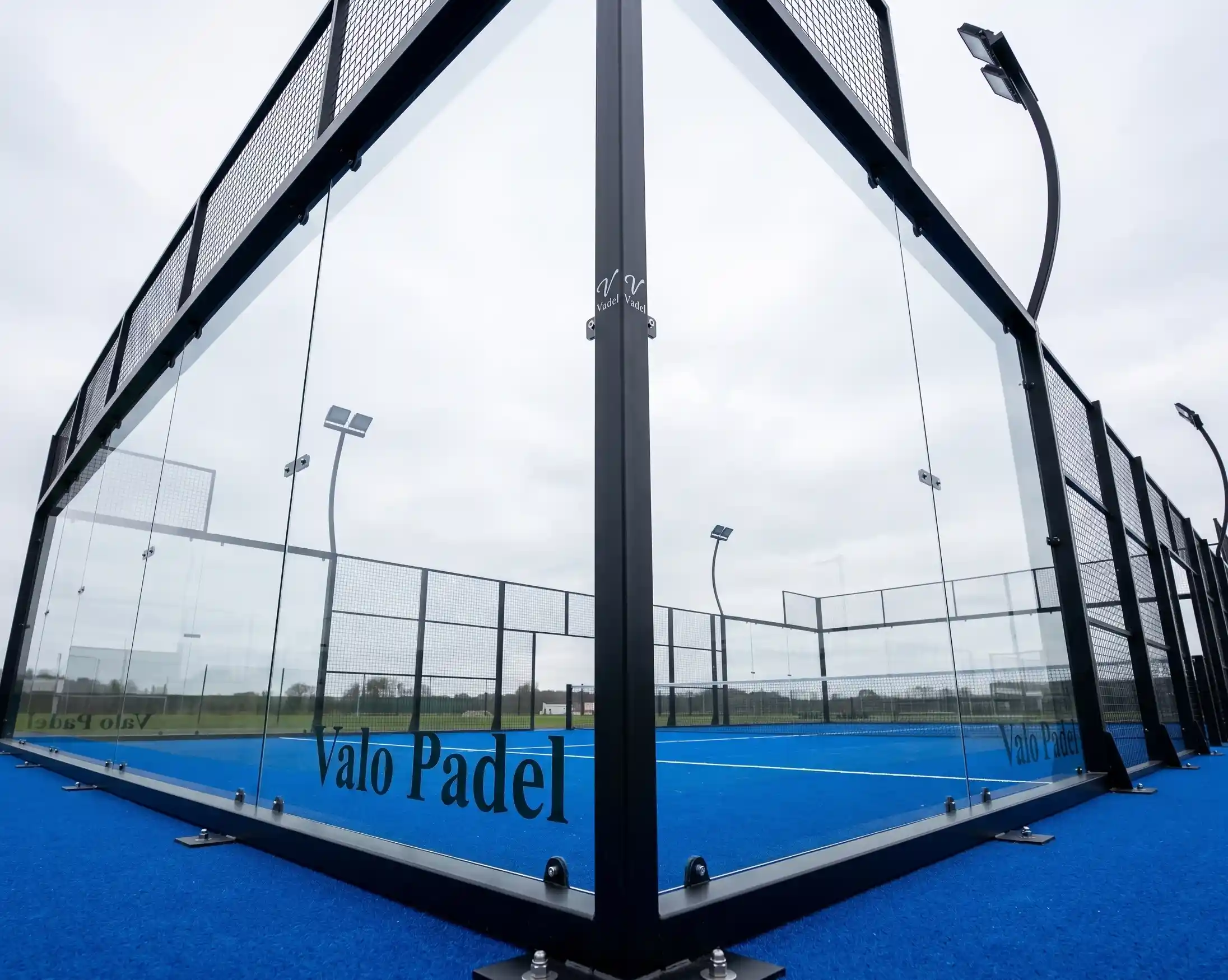 Signature Panoramic padel court glass corner and steel corner-post detail